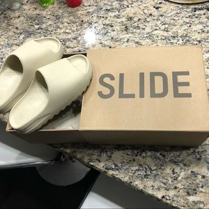 yeezy slides in bone